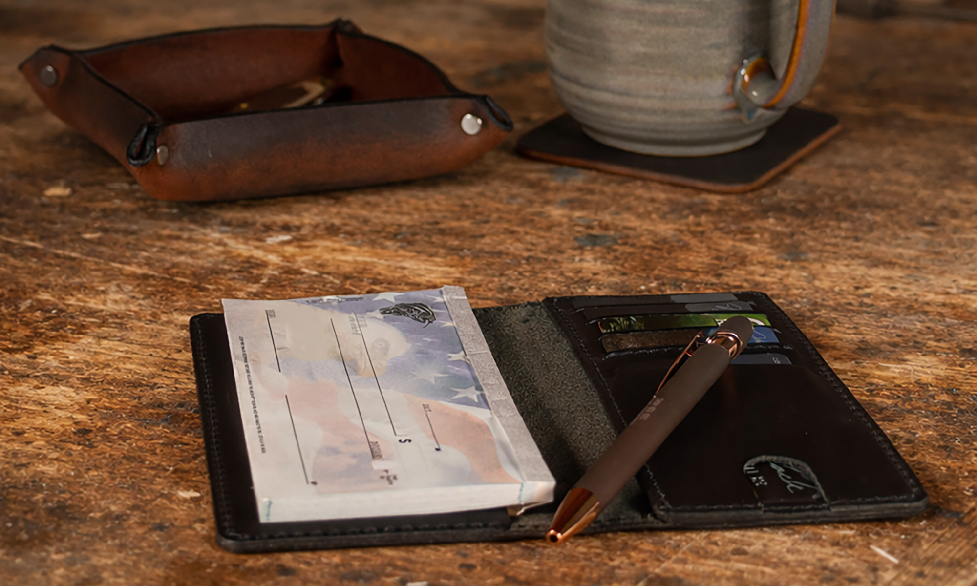 Leather checkbook cover laying on counter top