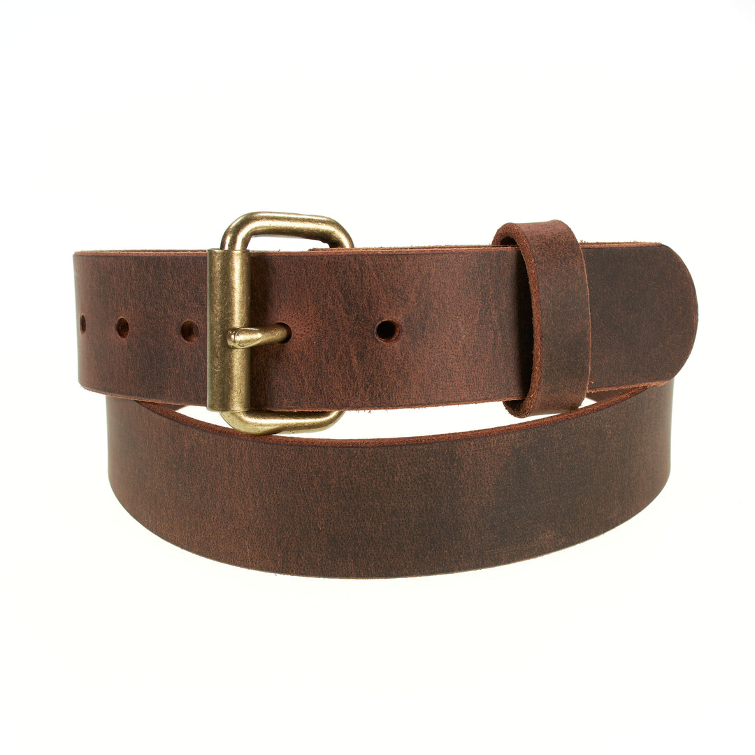 Brown leather belt with brass buckle on a white background