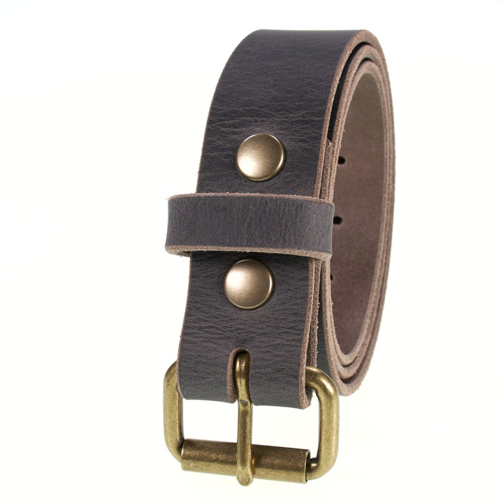 Brown leather belt with brass buckle and studs on a white background