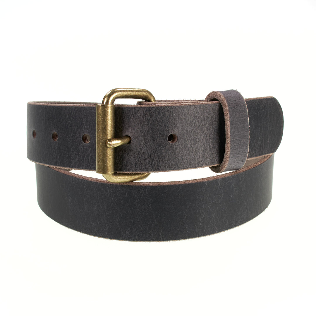 Brown leather belt with brass buckle on a white background