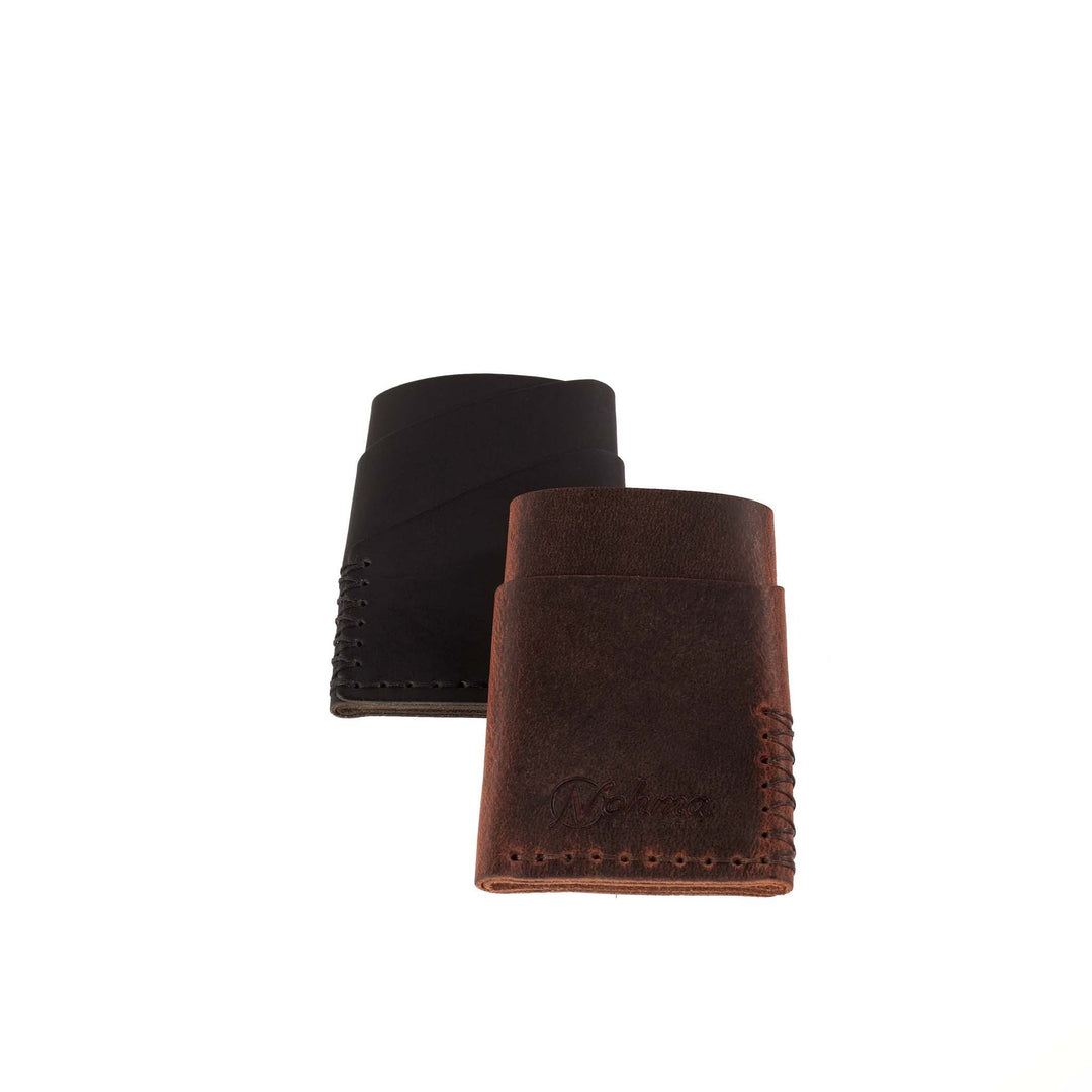 Two leather wallets, one black and one brown, on a white background.